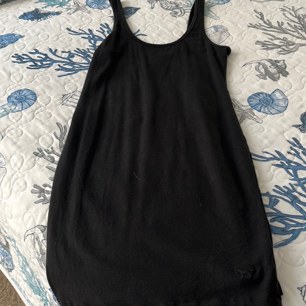 Tank dress. Worn a few times. Very form fitting and true to size.